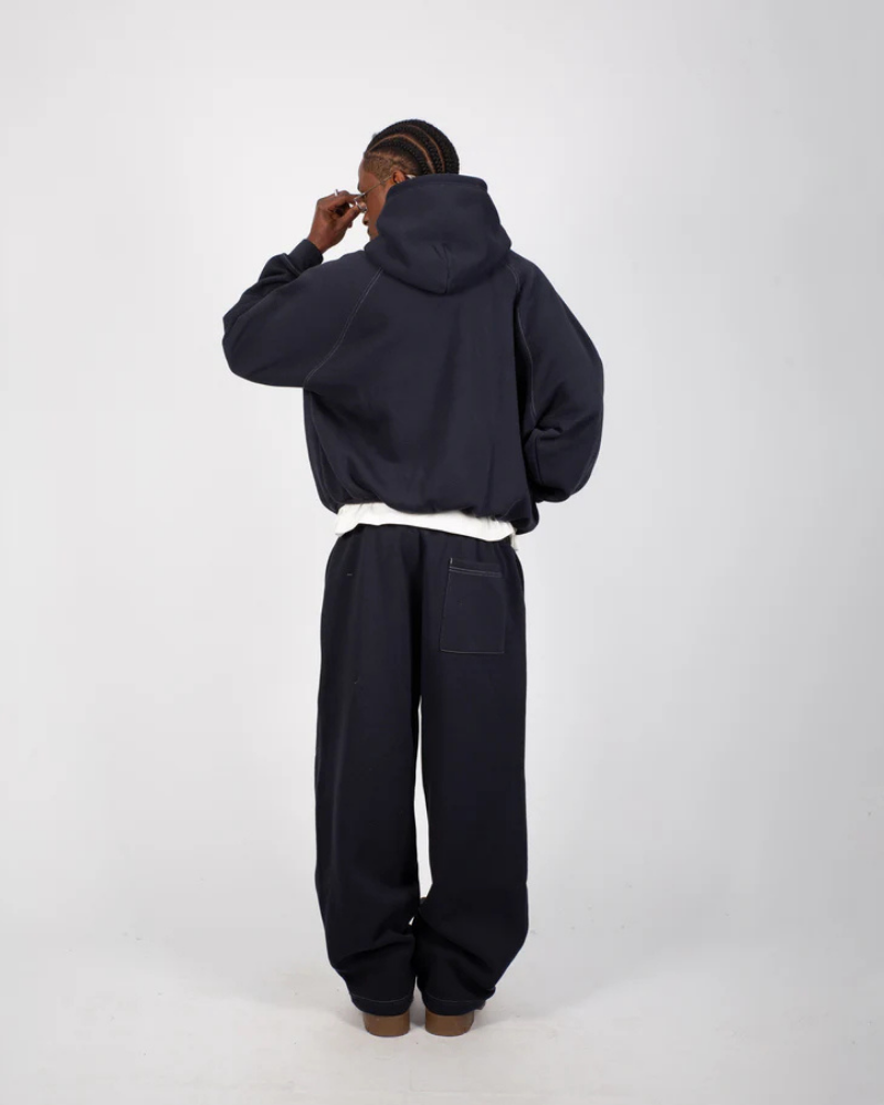 Black Relaxed-Fit Trousers with Curved Contrast Piping and Elastic Waist