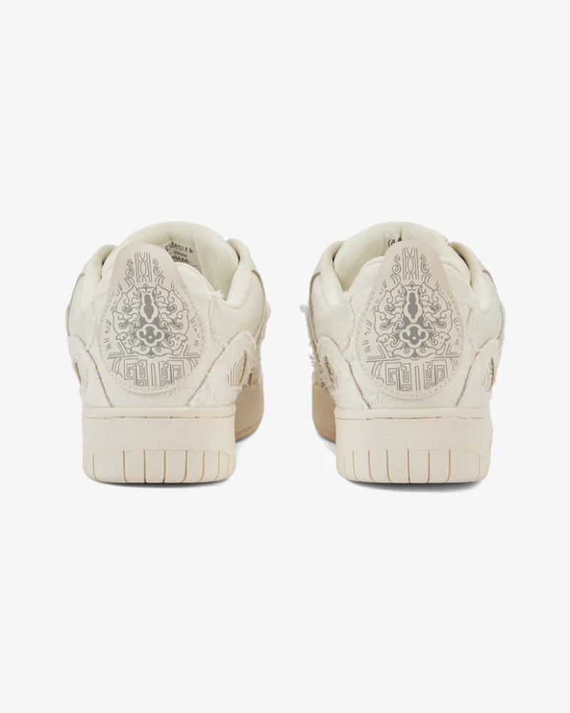 Cream Low-Top Sneakers with Distressed Canvas Overlays and Rope Laces