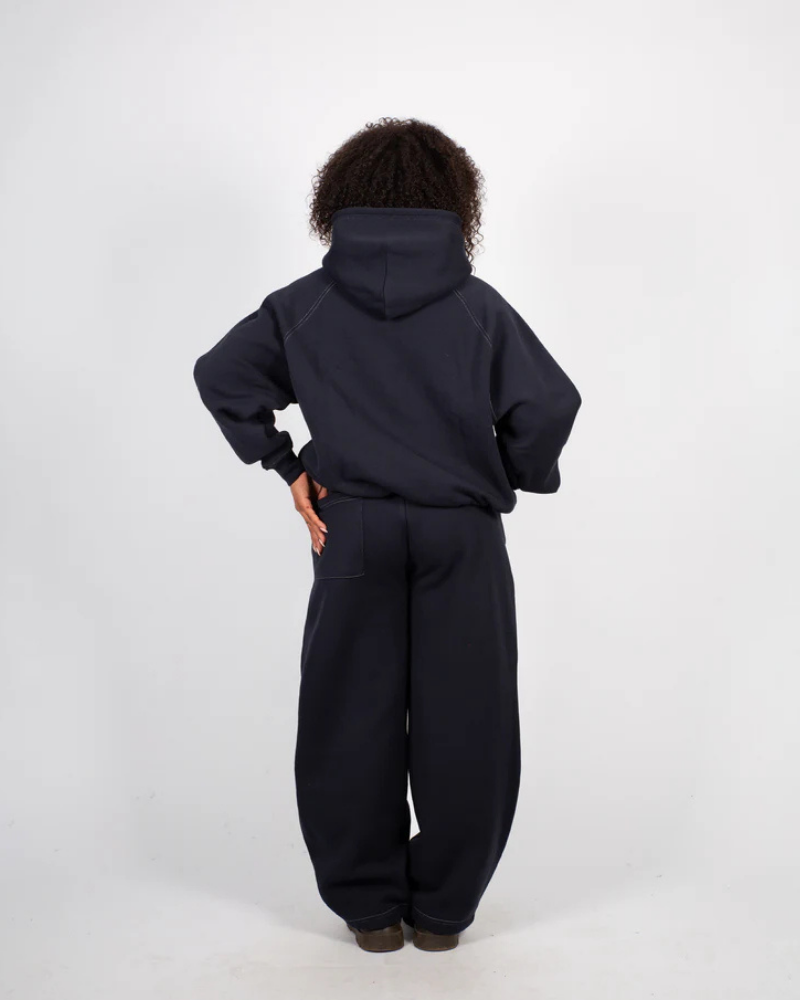 Black Relaxed-Fit Trousers with Curved Contrast Piping and Elastic Waist