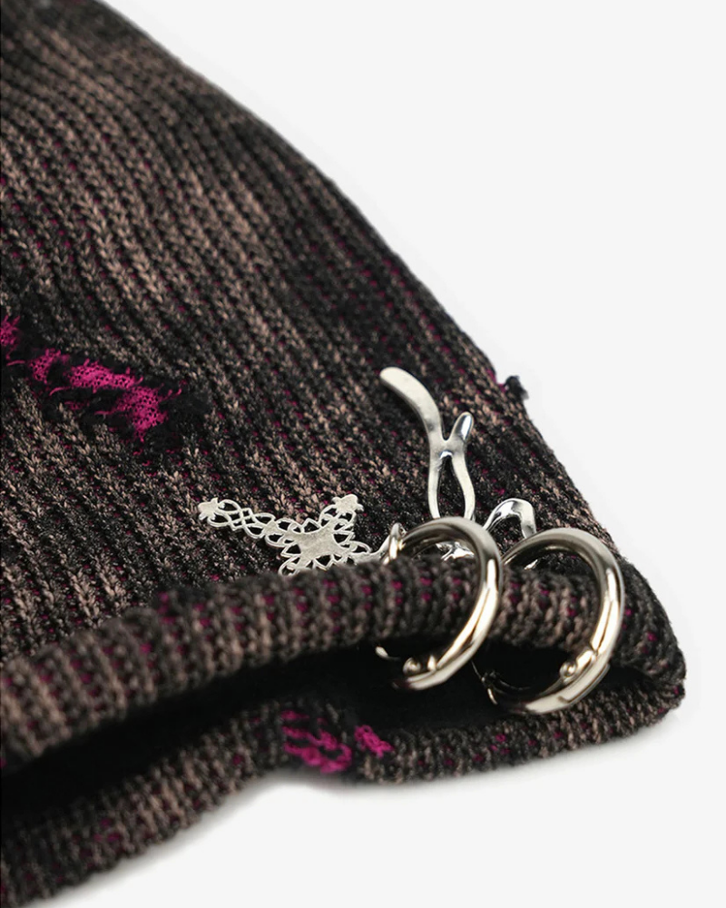 Distressed Knit Beanie with Metallic Charms and Contrast Details
