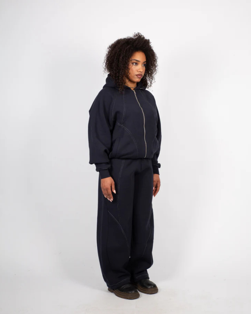 Black Relaxed-Fit Trousers with Curved Contrast Piping and Elastic Waist