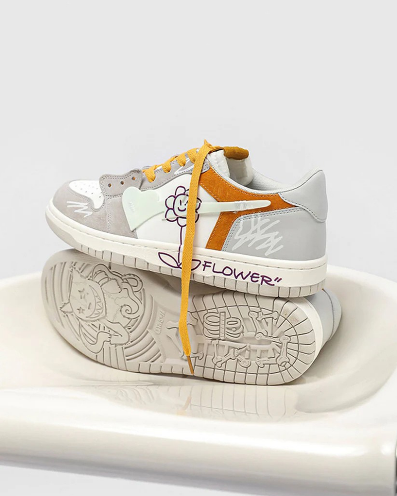 White and Grey Low-Top Sneakers with Purple Flower Graphic and Yellow Laces