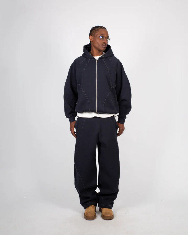 Black Relaxed-Fit Trousers with Curved Contrast Piping and Elastic Waist