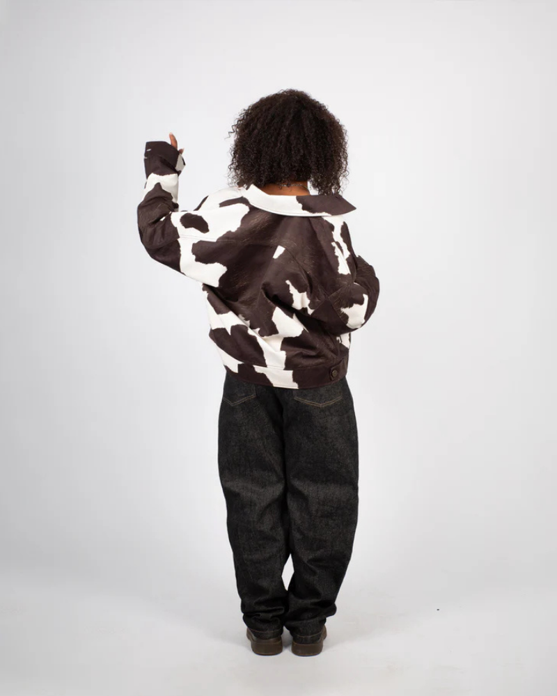 Cow Print Trucker Jacket with Textured Finish and Metal Hardware